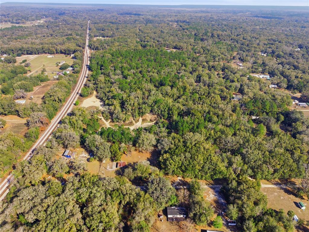 28 Northeast 164th Lane Citra, FL 32113 - Photo 12 of 29 an aerial view of residential house with parking space
