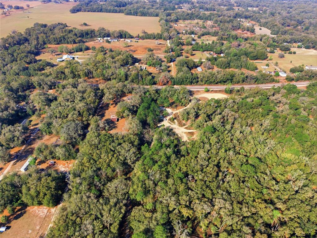 28 Northeast 164th Lane Citra, FL 32113 - Photo 5 of 29 an aerial view of residential houses with outdoor space