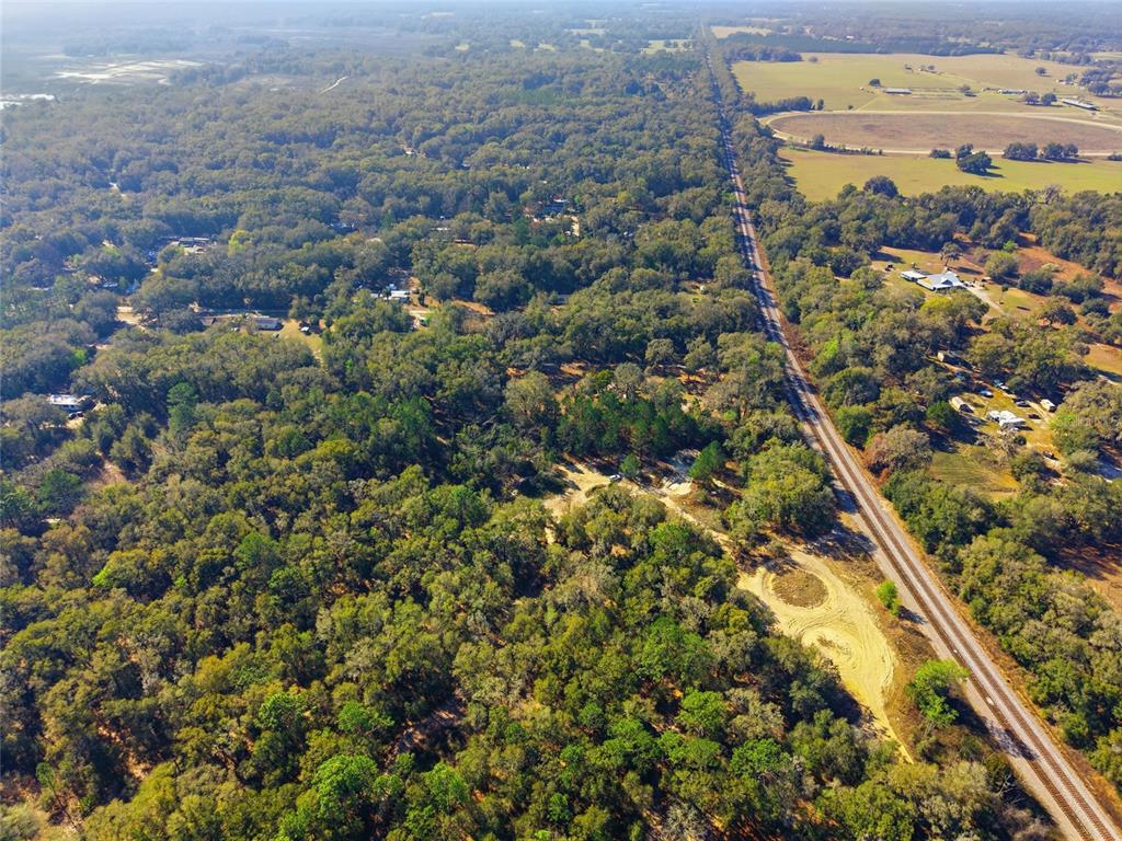 28 Northeast 164th Lane Citra, FL 32113 - Photo 6 of 29 an aerial view of residential houses with outdoor space