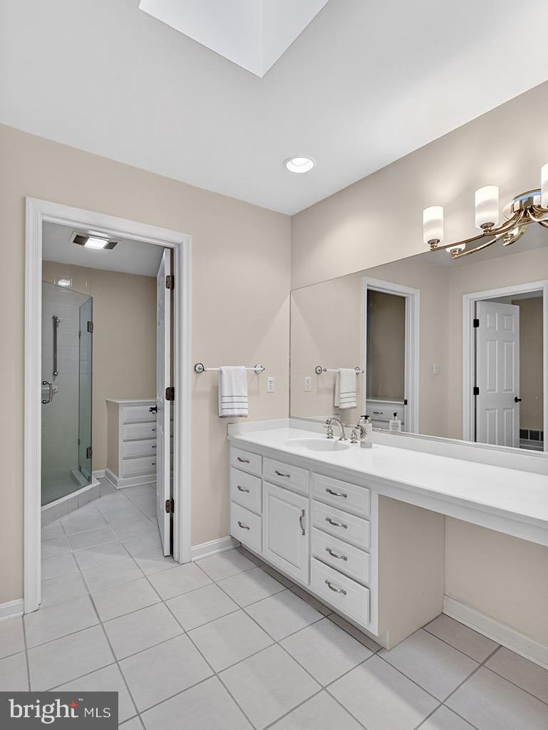 23 Sheffield Road Rehoboth Beach, DE 19971 - Photo 45 of 100 Ensuite adds to the home's functionality.