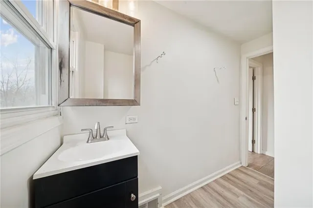 a bathroom with a bathtub and shower
