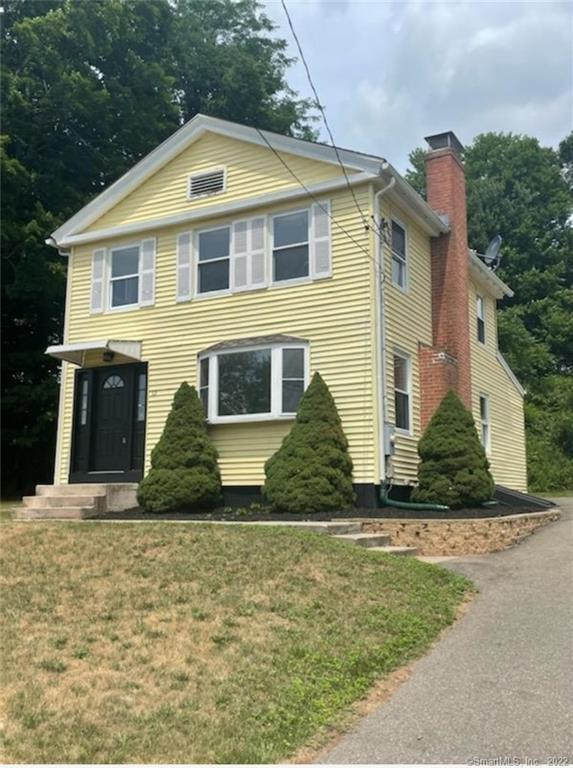65 Nooks Hill Road Cromwell, CT 06416 - Photo 1 of 1 a front view of a house with a yard