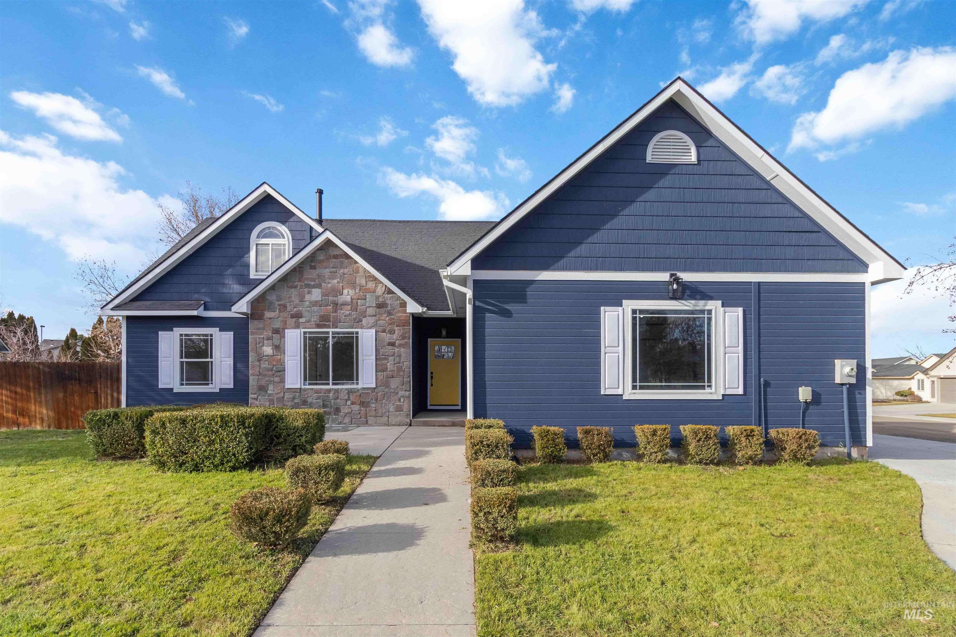 View of front of home featuring stone siding