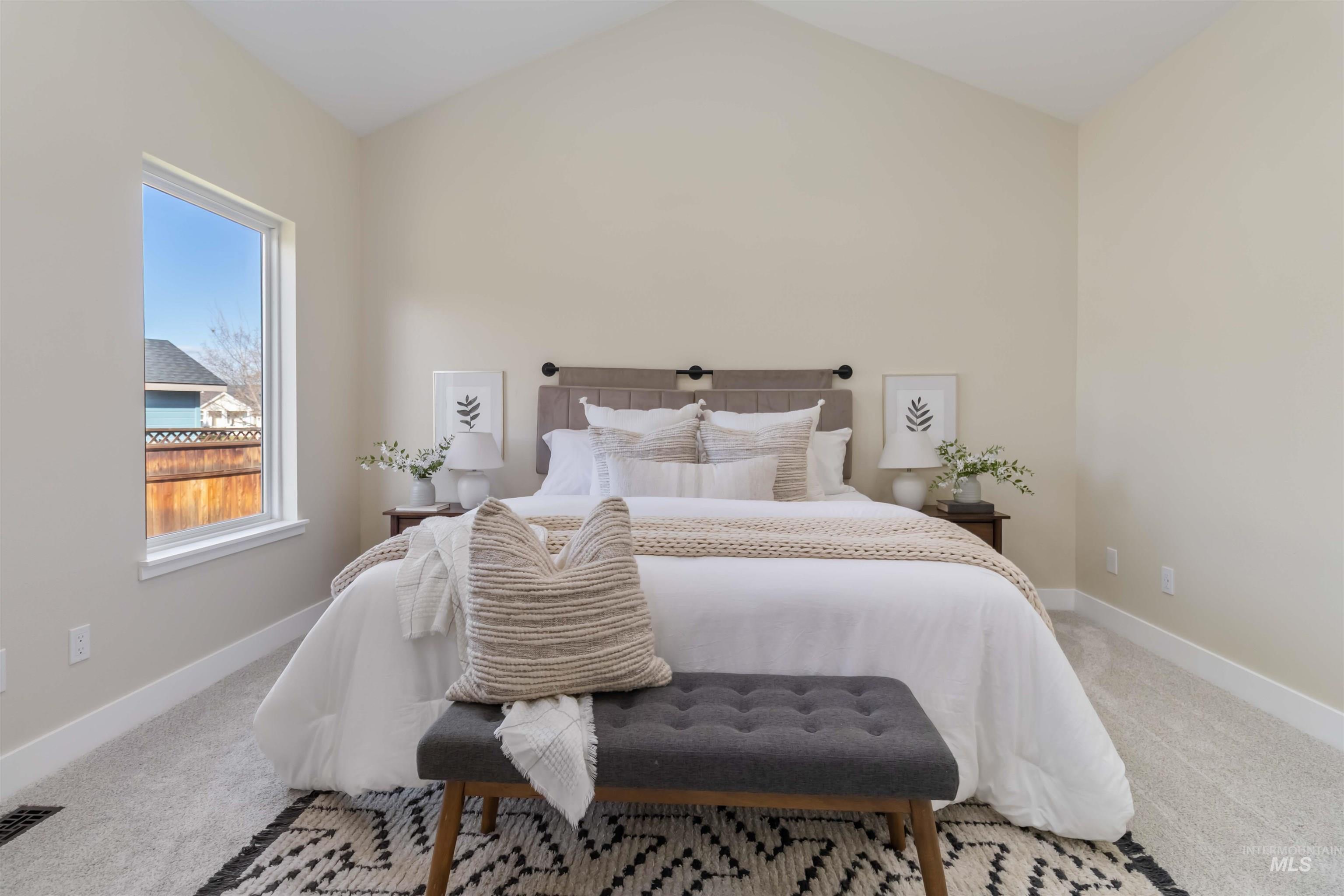 3201 Raintree Drive Nampa, ID 83686 - Photo 16 of 50 Bedroom featuring carpet flooring and lofted ceiling