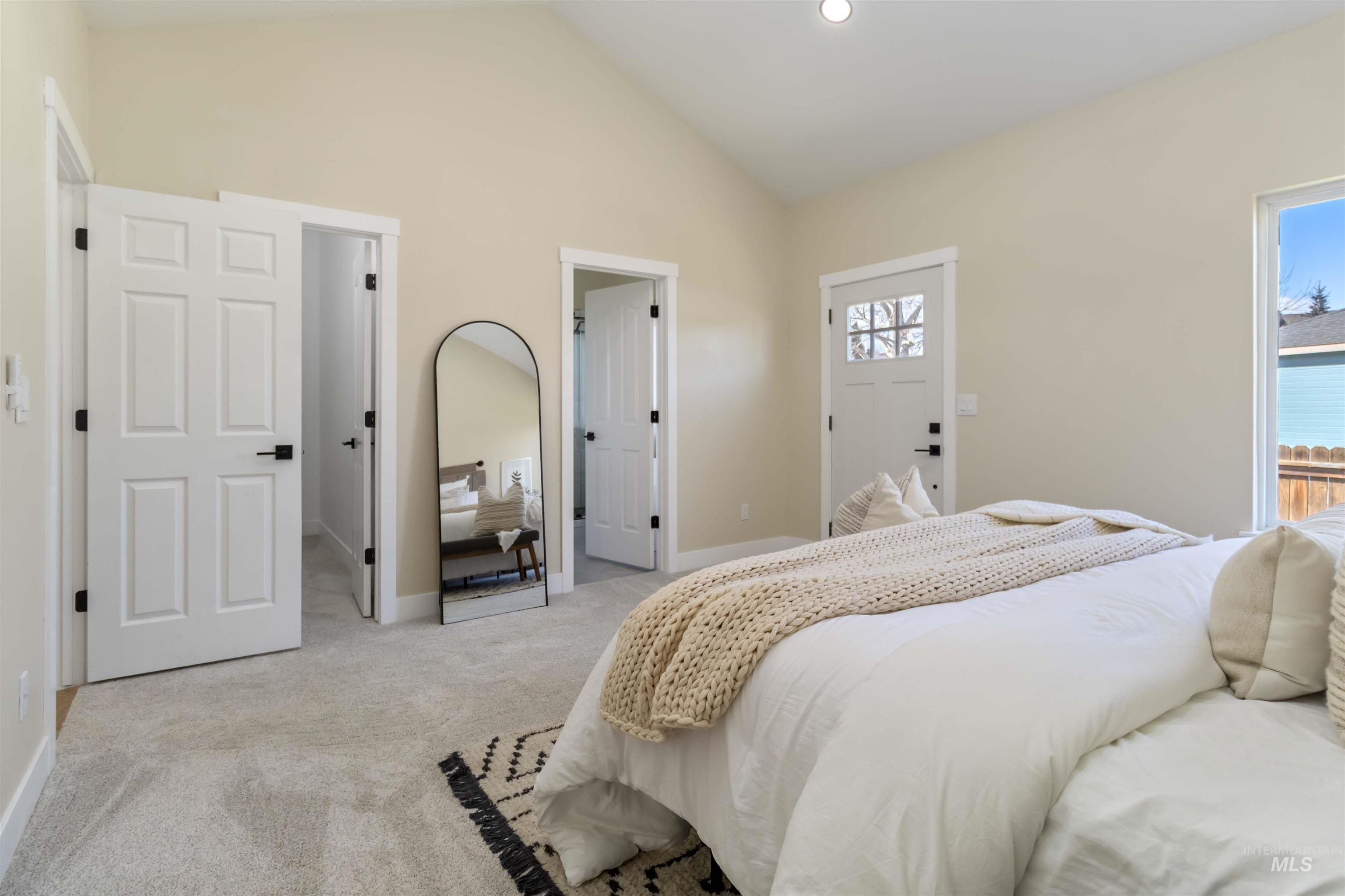 3201 Raintree Drive Nampa, ID 83686 - Photo 17 of 50 Carpeted bedroom with vaulted ceiling and recessed lighting