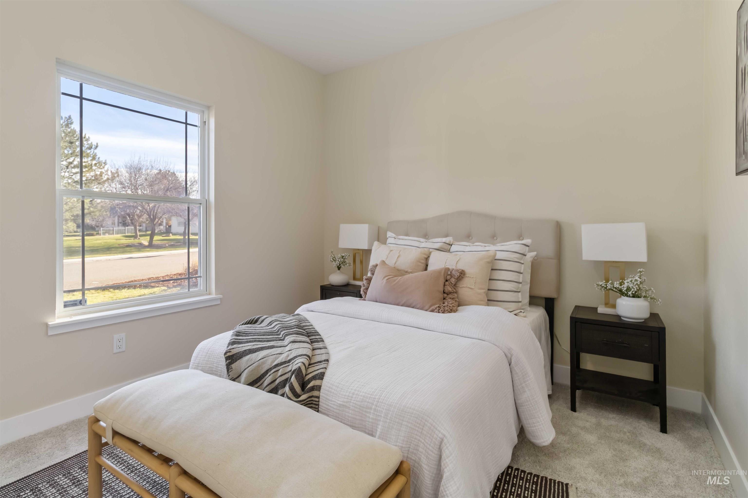 3201 Raintree Drive Nampa, ID 83686 - Photo 28 of 50 Bedroom with carpet floors and baseboards