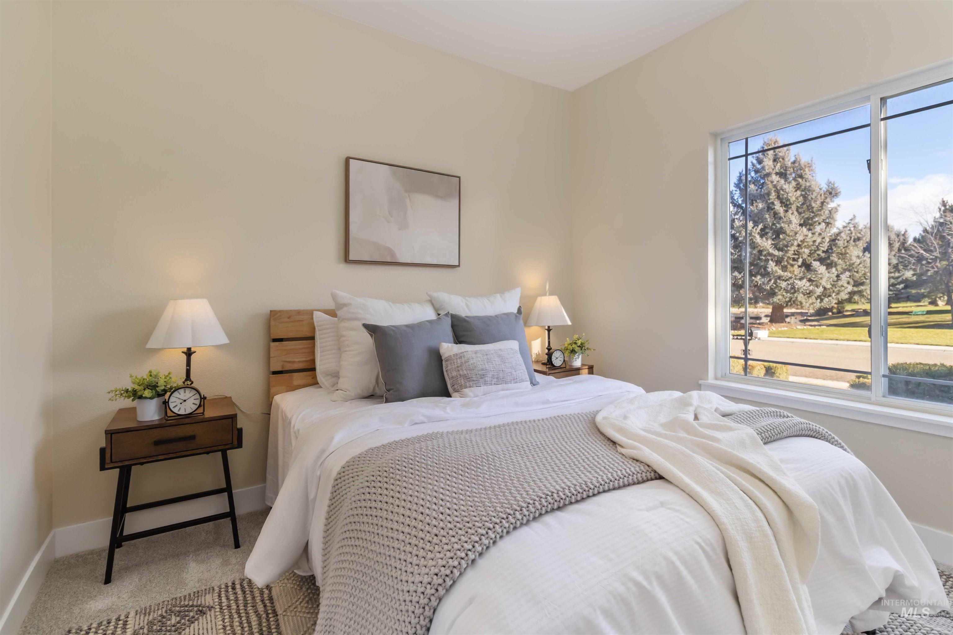 3201 Raintree Drive Nampa, ID 83686 - Photo 29 of 50 Bedroom featuring baseboards and carpet