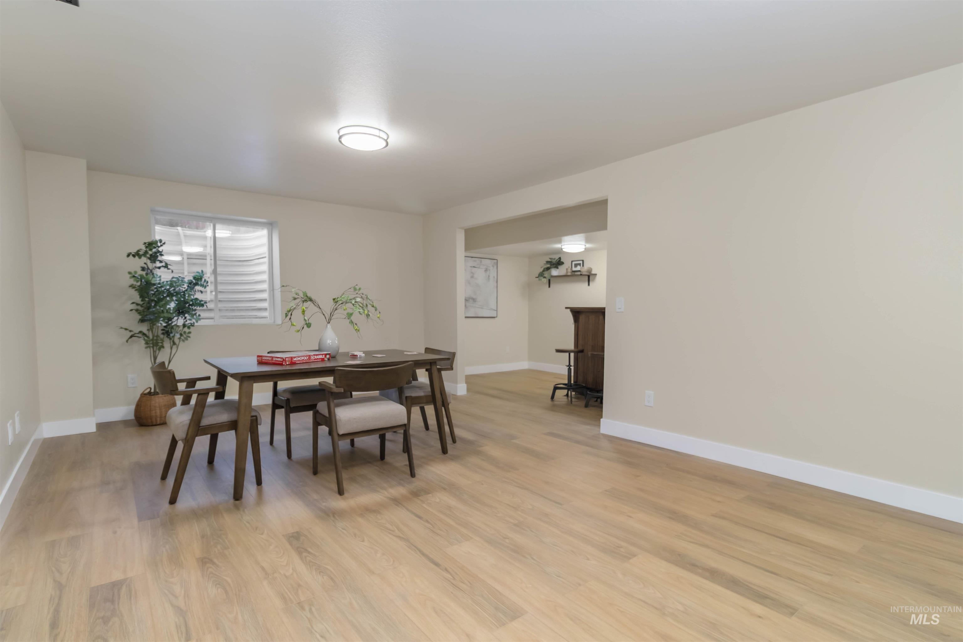 3201 Raintree Drive Nampa, ID 83686 - Photo 35 of 50 Dining area featuring baseboards and light wood-type flooring