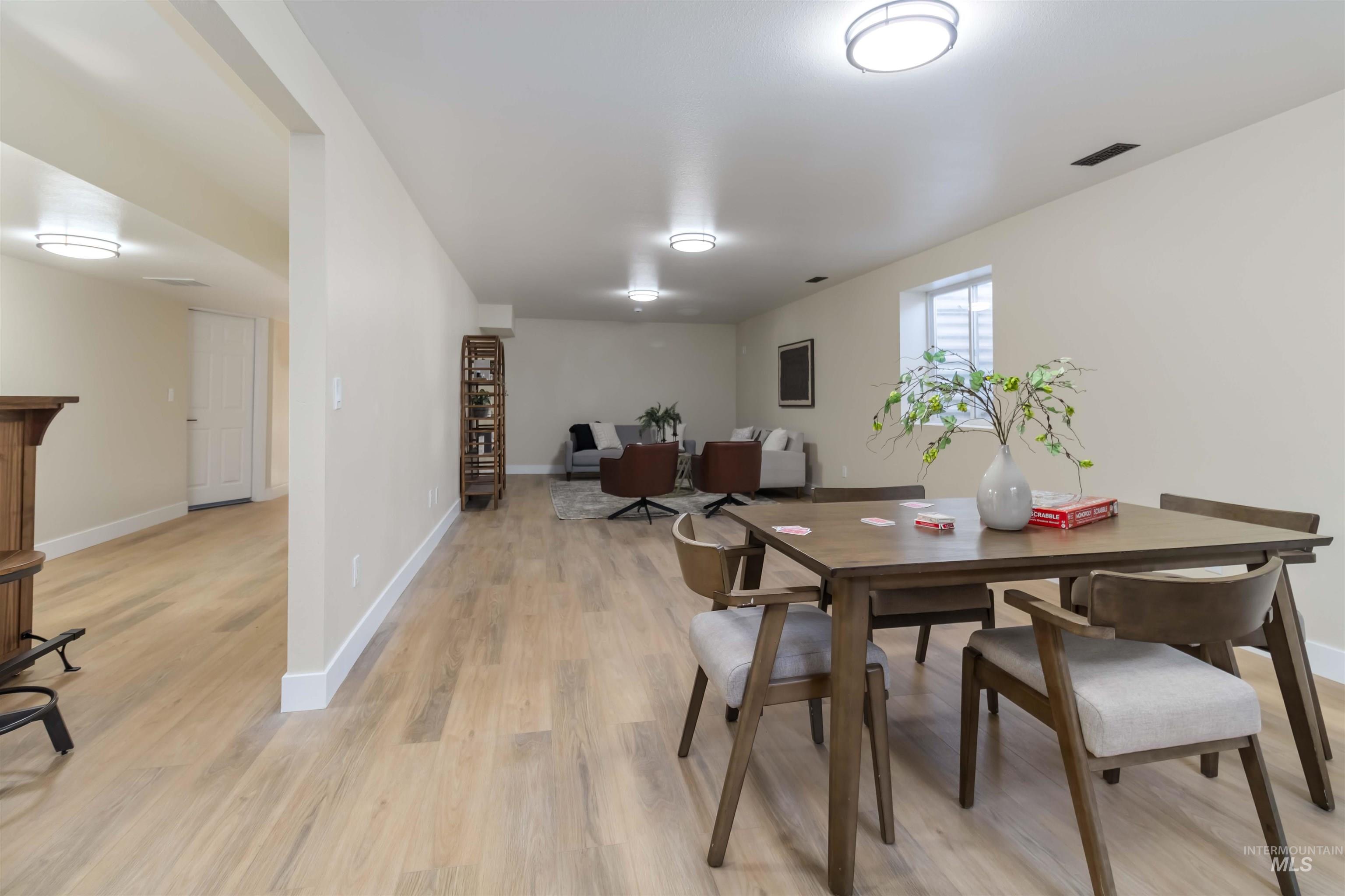 3201 Raintree Drive Nampa, ID 83686 - Photo 36 of 50 Dining area featuring baseboards and light wood finished floors
