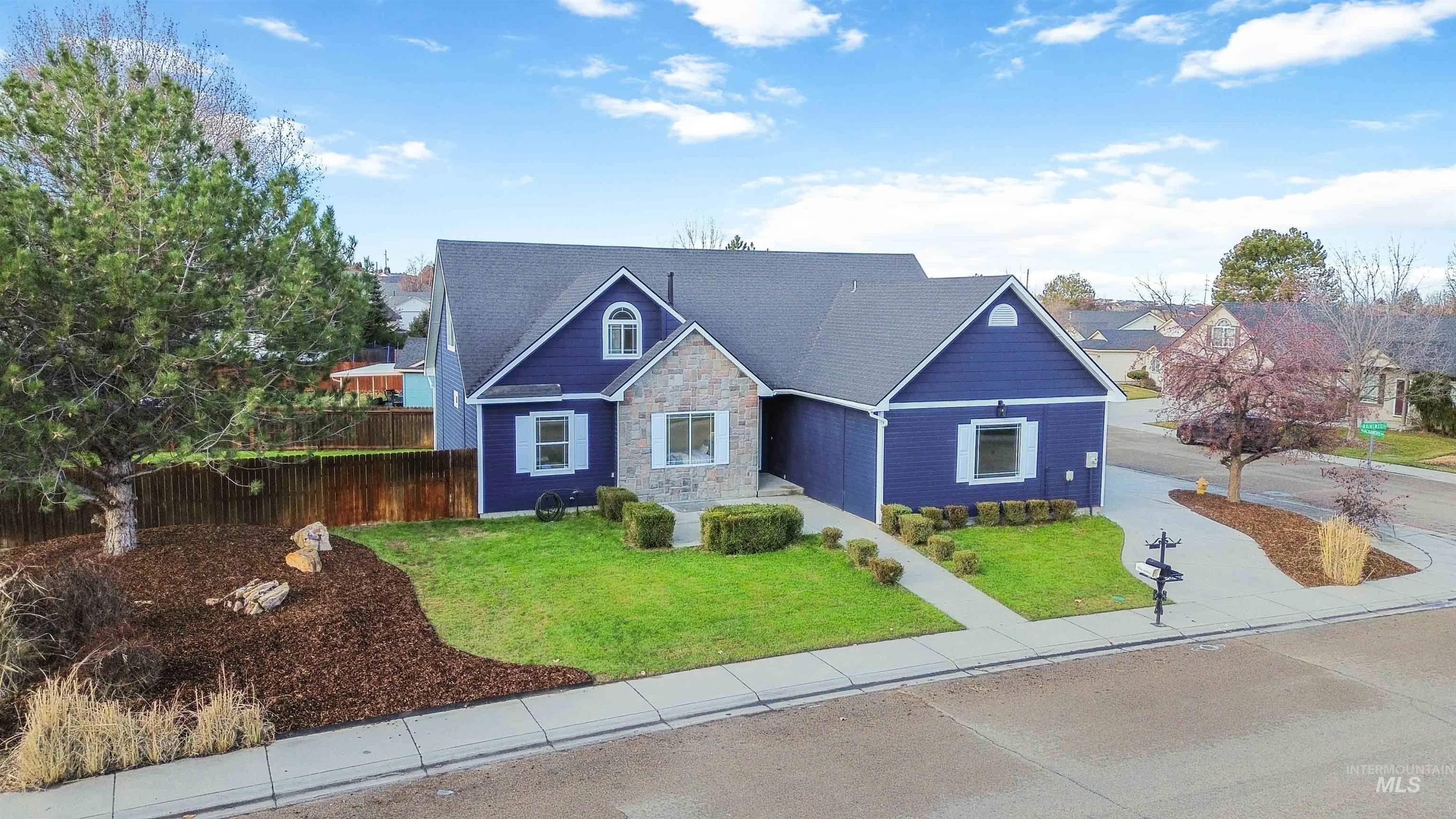 3201 Raintree Drive Nampa, ID 83686 - Photo 40 of 50 View of front facade featuring stone siding and a shingled roof