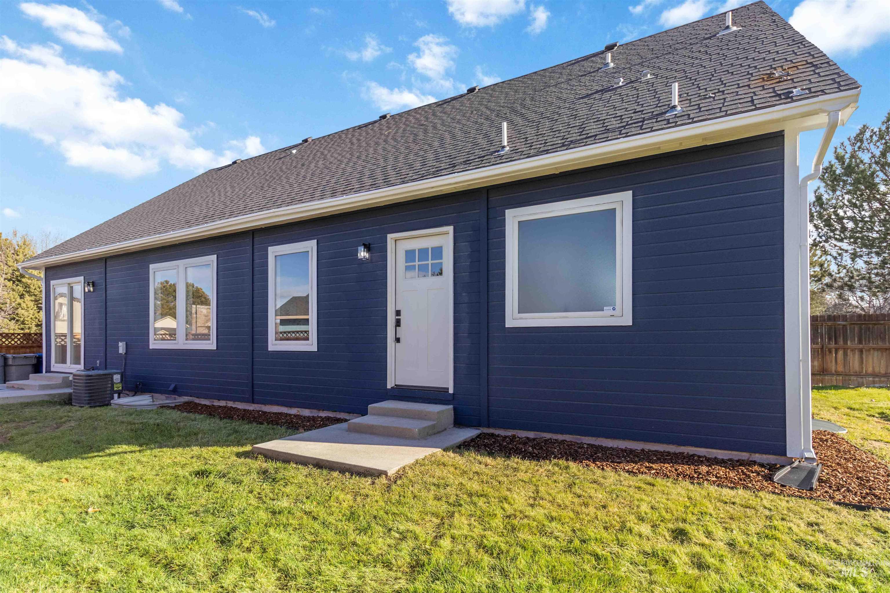 3201 Raintree Drive Nampa, ID 83686 - Photo 41 of 50 Rear view of property featuring entry steps