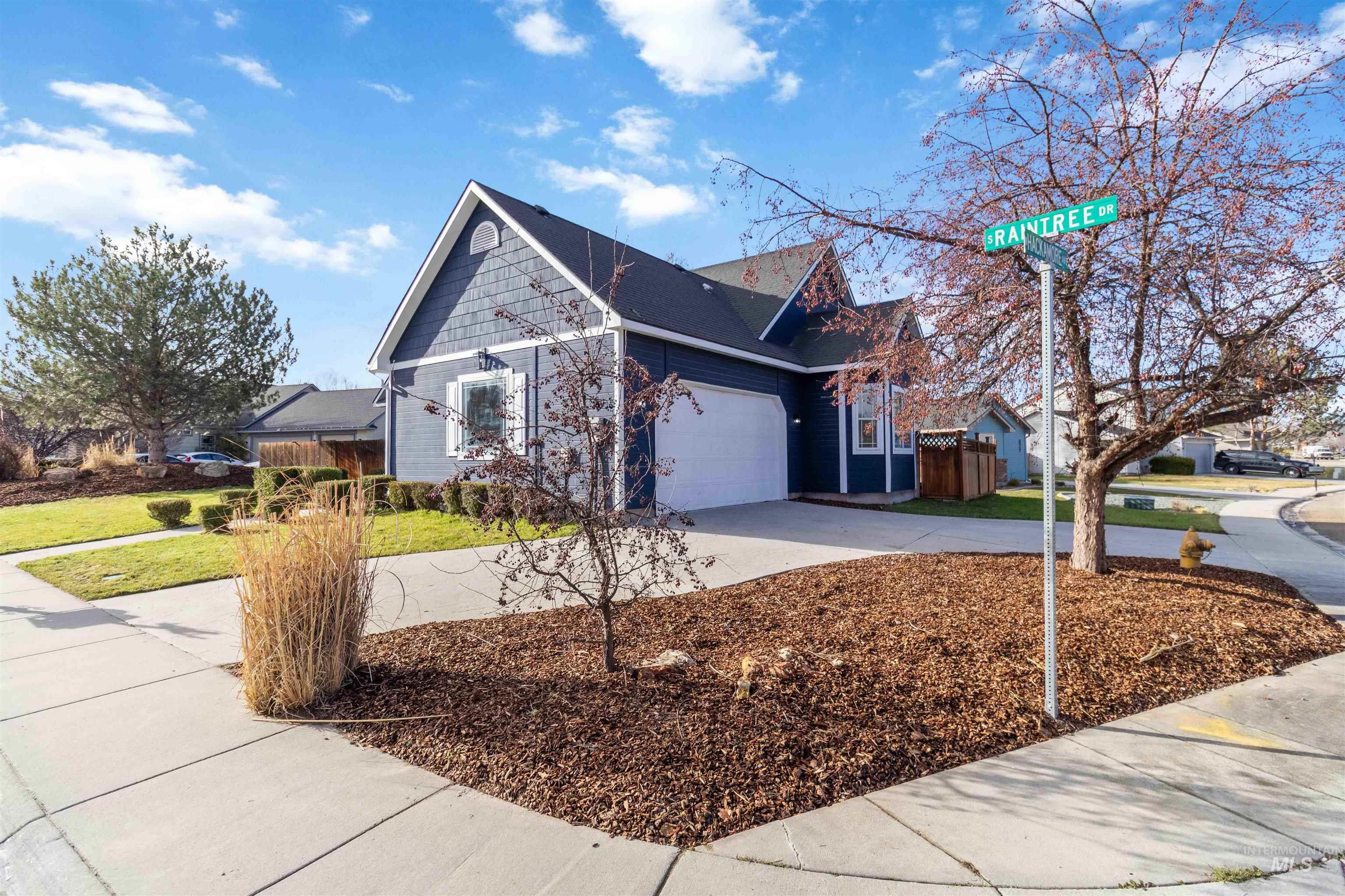 3201 Raintree Drive Nampa, ID 83686 - Photo 5 of 50 View of front of house with driveway and an attached garage