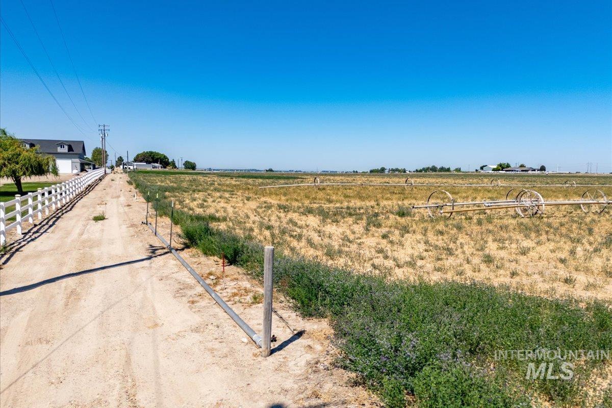 Tbd Homedale Road Caldwell, ID 83607 - Photo 15 of 23 View of dirt / gravel driveway featuring a view of rural / pastoral area
