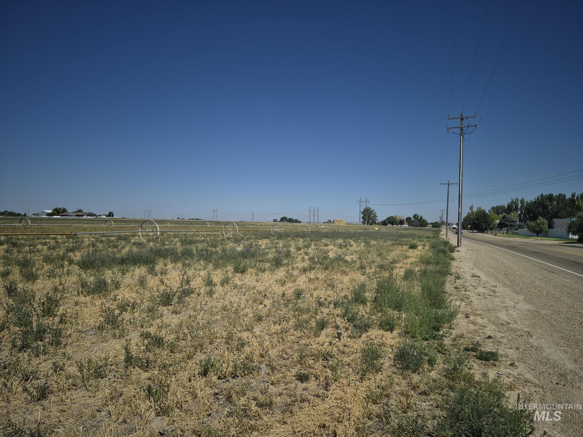 Tbd Homedale Road Caldwell, ID 83607 - Photo 19 of 23 View of asphalt road with a rural view