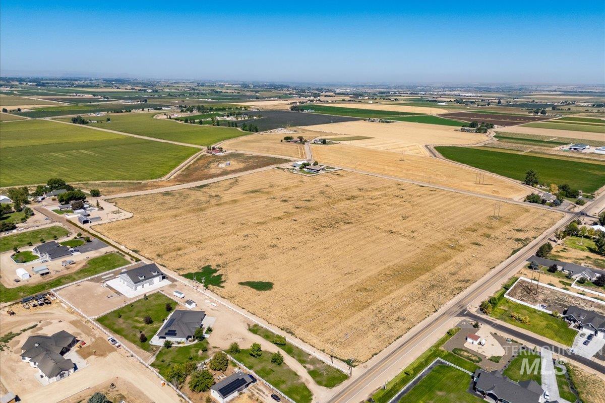 Tbd Homedale Road Caldwell, ID 83607 - Photo 6 of 23 Aerial view of property's location with rural landscape and rows of crops