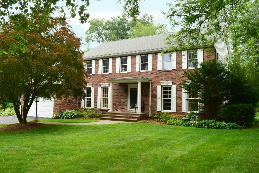 7 Meadowbrook Road Somers, CT 06071 - Photo 1 of 1 a front view of a house with a yard