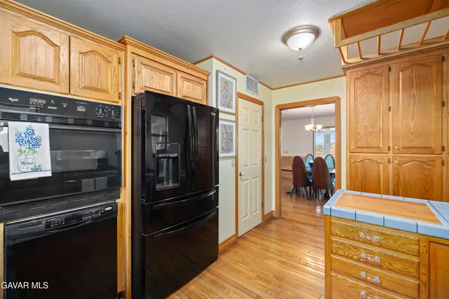 a view of a room with furniture and windows