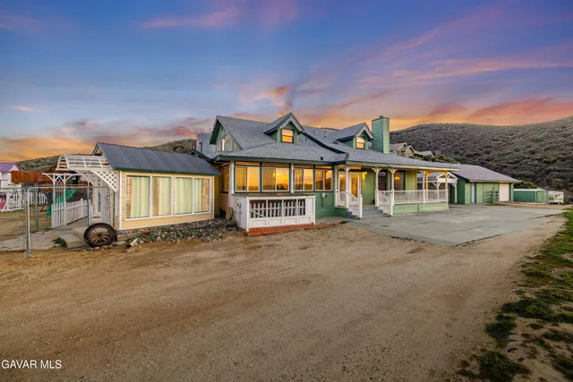 a view of an house with a street