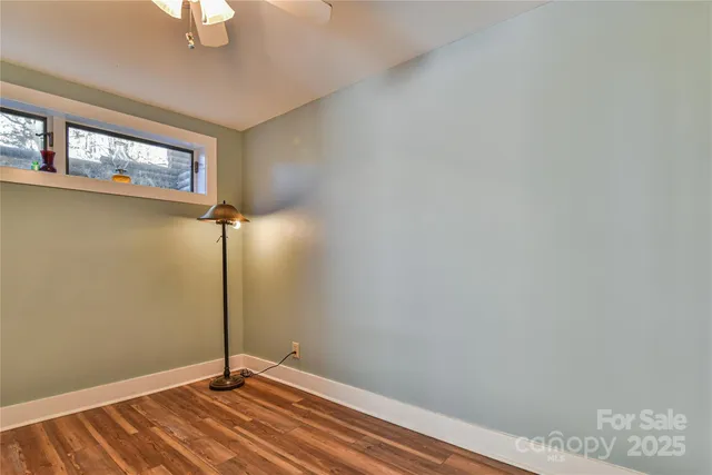 a view of a room with a window