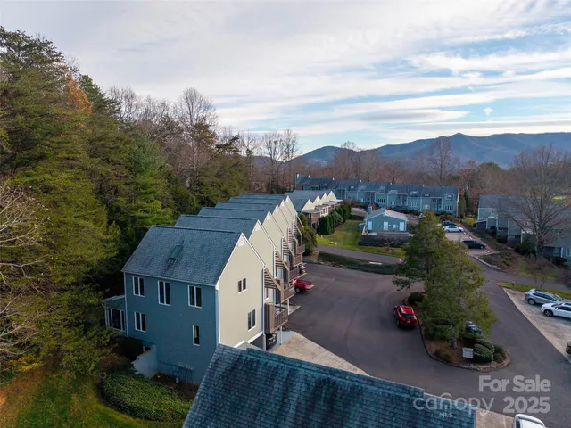 an aerial view of a house with a garden