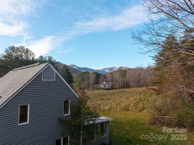 a view of house with mountain