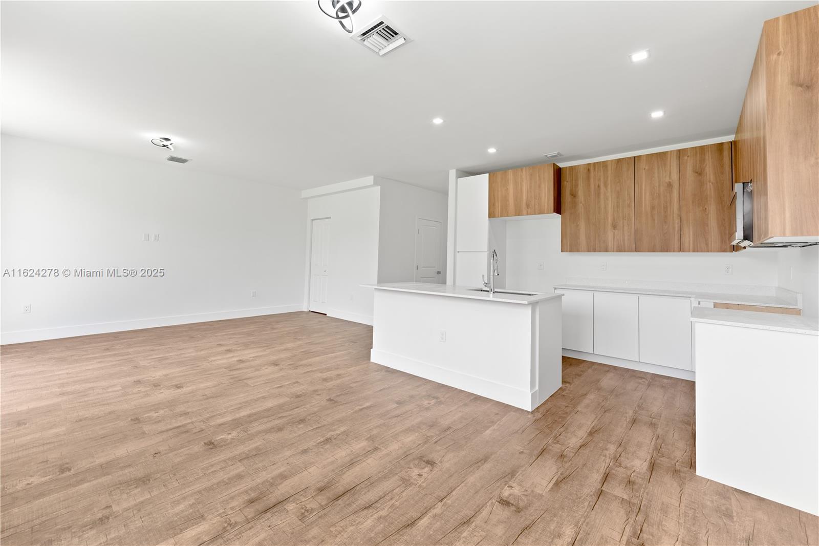 866 Southwest 1st Street Florida City, FL 33034 - Photo 11 of 52 a view of kitchen with wooden floor