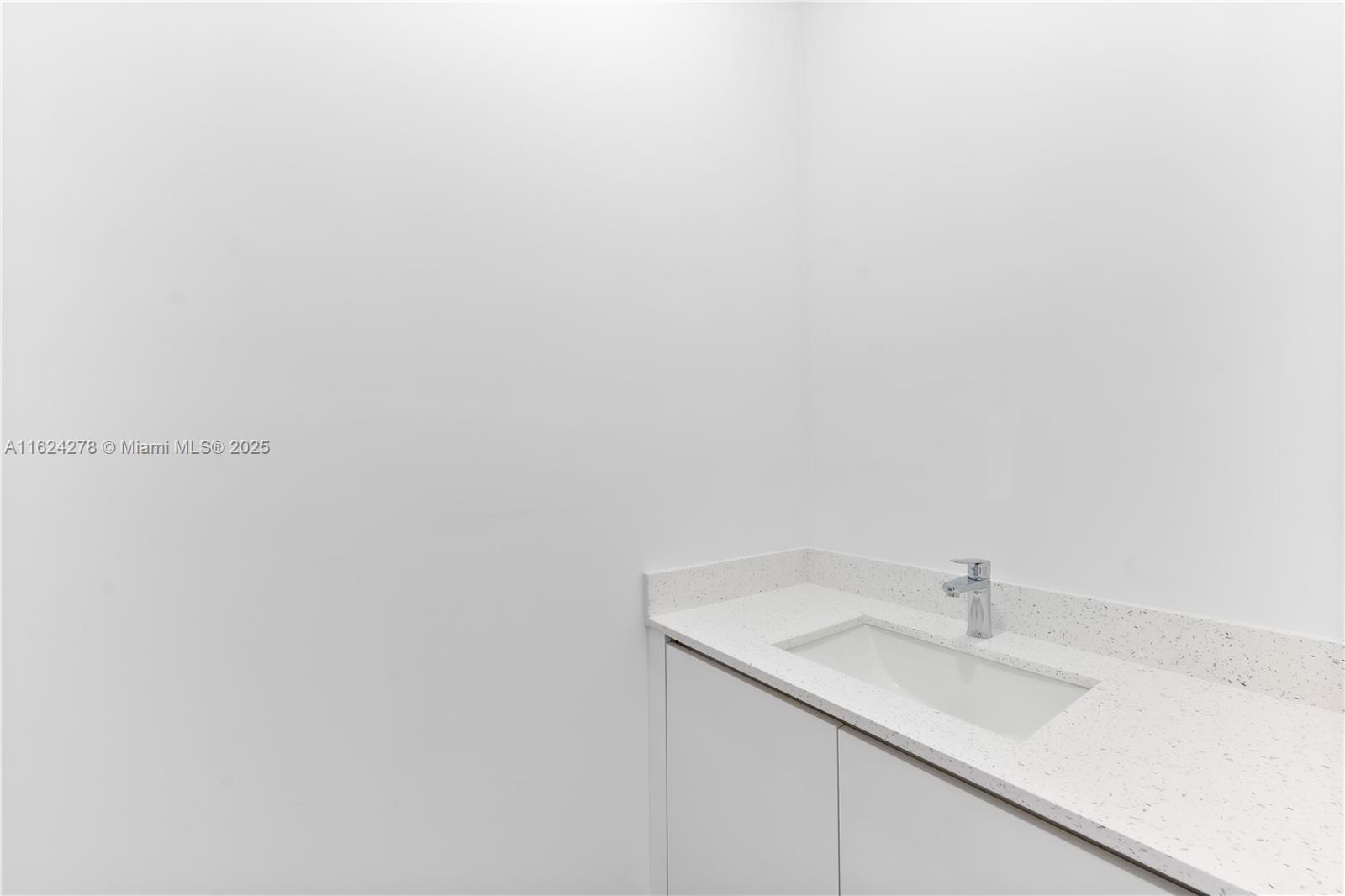 866 Southwest 1st Street Florida City, FL 33034 - Photo 15 of 52 a bathroom with a sink and a vanity
