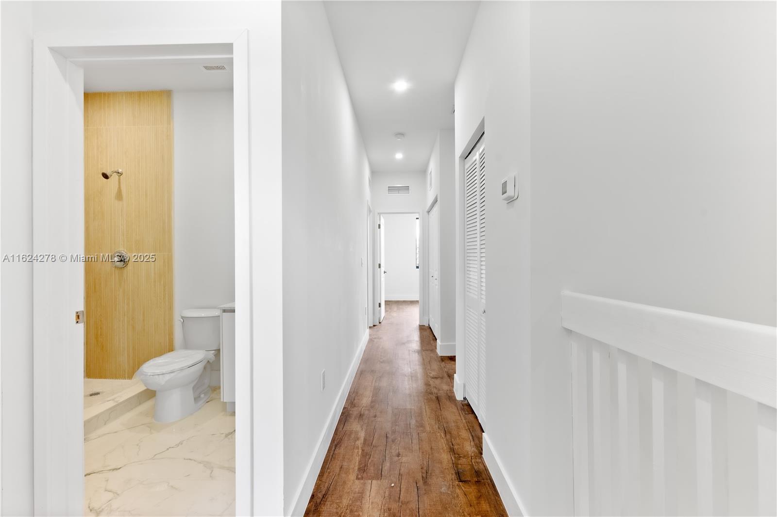 866 Southwest 1st Street Florida City, FL 33034 - Photo 16 of 52 a view of a bathroom from a hallway