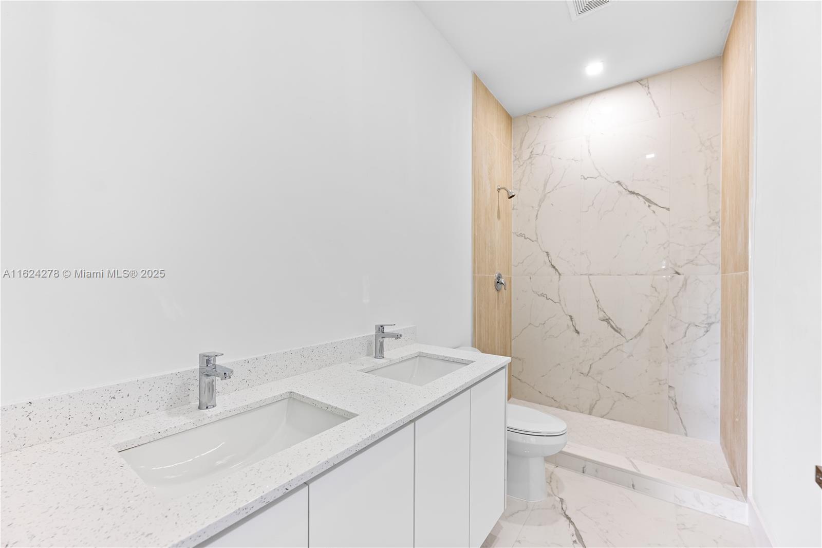 866 Southwest 1st Street Florida City, FL 33034 - Photo 23 of 52 a bathroom with a sink toilet and shower