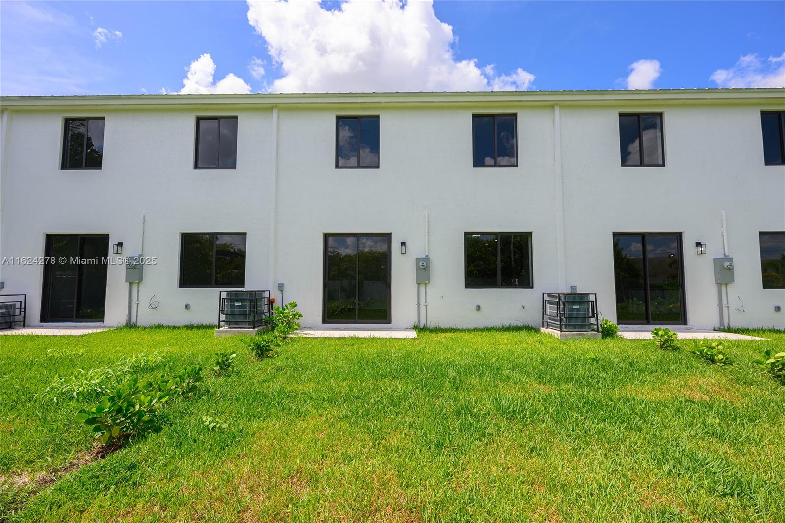 866 Southwest 1st Street Florida City, FL 33034 - Photo 26 of 52 a view of a house with a yard and sitting area