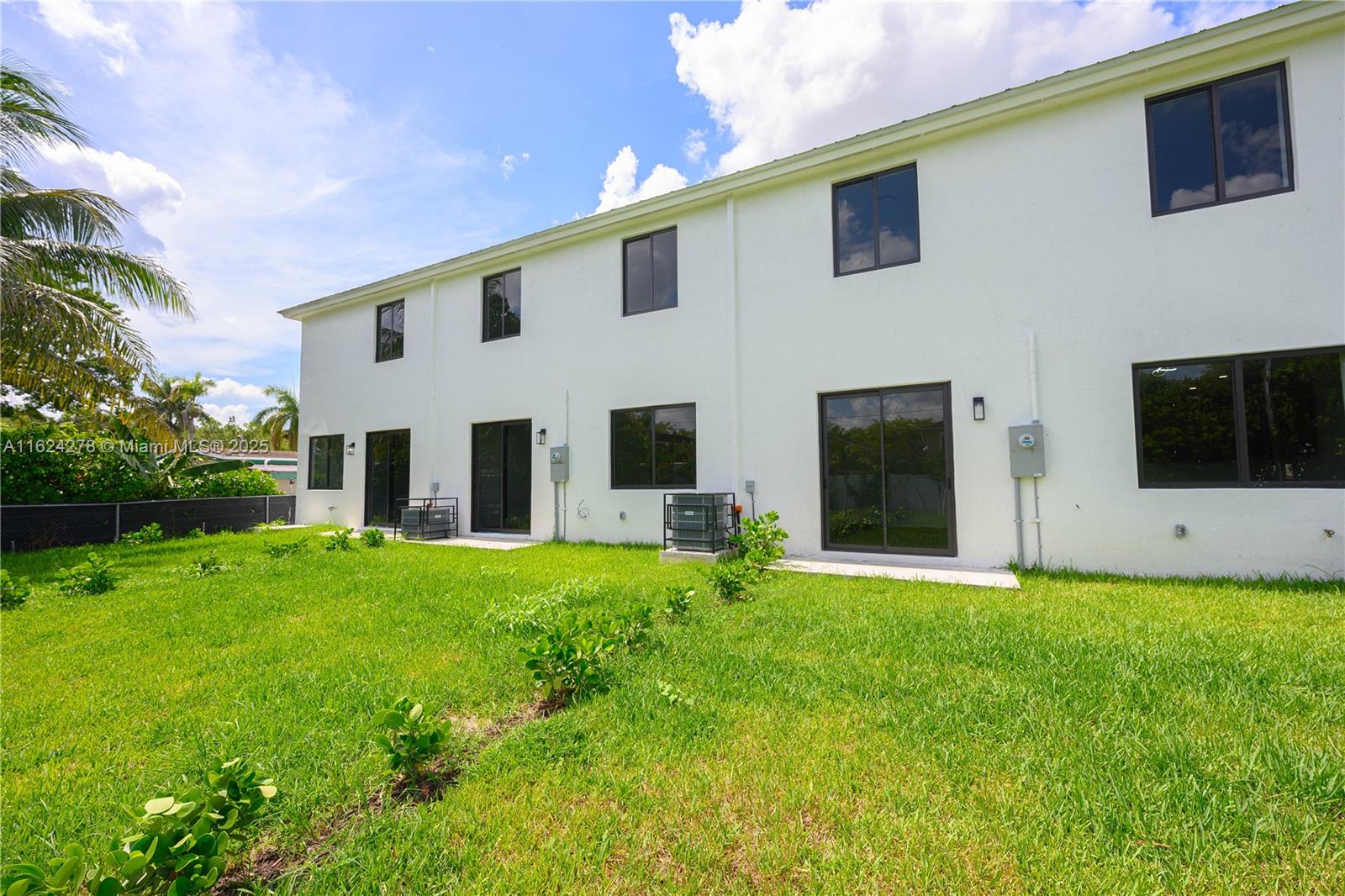 866 Southwest 1st Street Florida City, FL 33034 - Photo 28 of 52 a view of an house with backyard space and garden