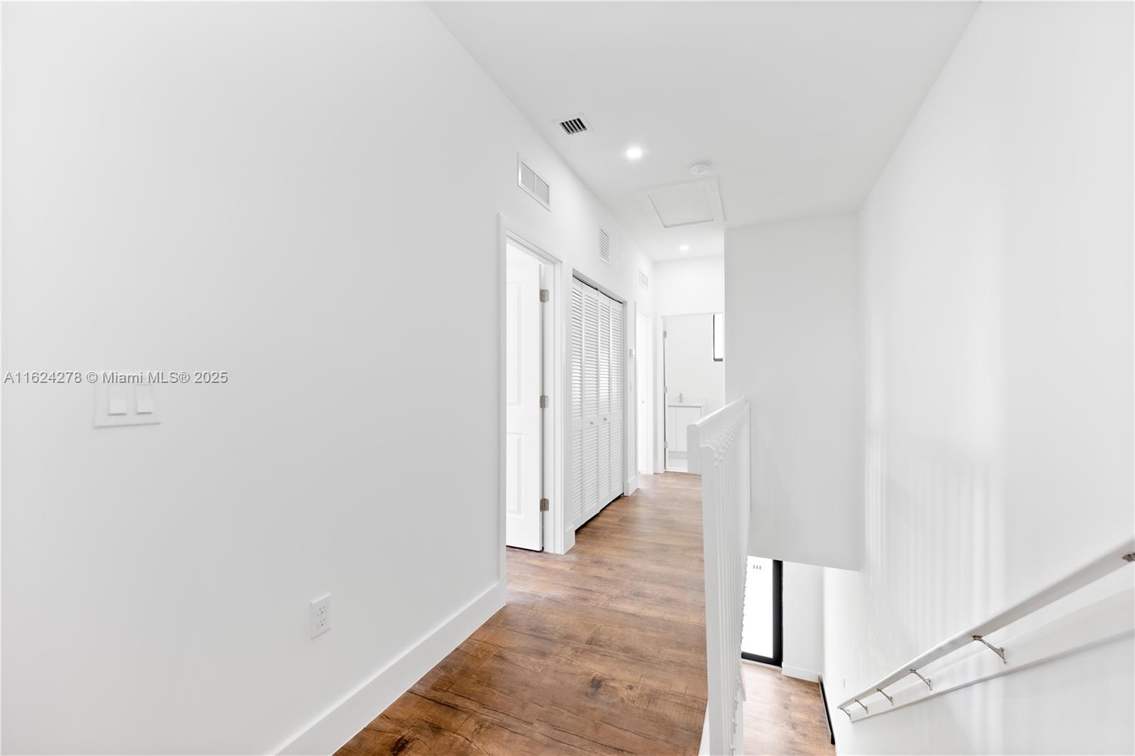 866 Southwest 1st Street Florida City, FL 33034 - Photo 40 of 52 a view of a hallway with wooden floor