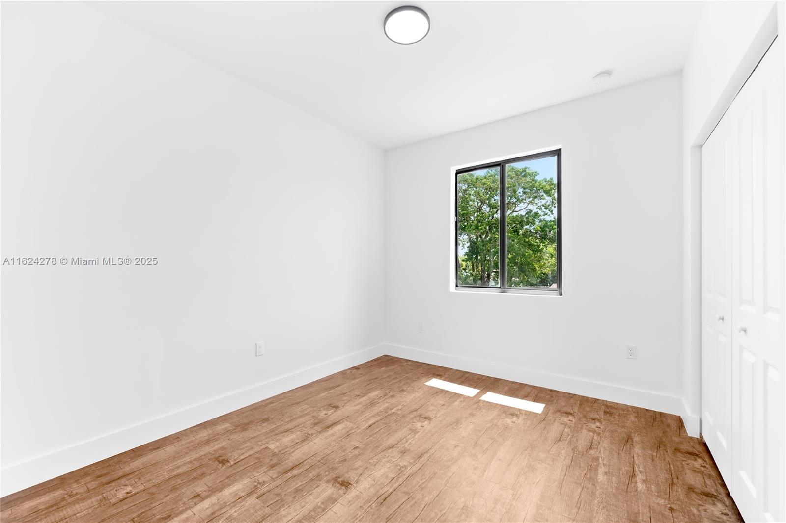 866 Southwest 1st Street Florida City, FL 33034 - Photo 44 of 52 a view of empty room with wooden floor