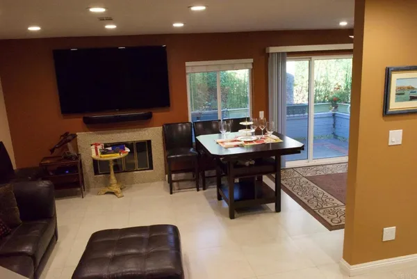 a room with furniture and a flat screen tv