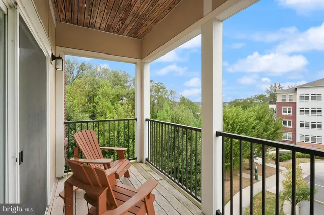 a view of balcony with furniture