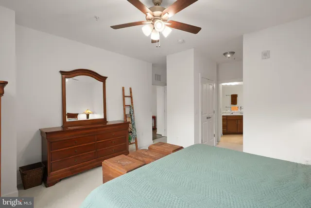 a bathroom with a double vanity sink and mirror