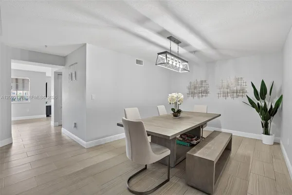 $455,000 | 17455 Northwest 75th Place, Unit 203, Hialeah, FL 33015