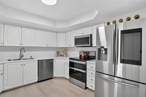 $455,000 | 17455 Northwest 75th Place, Unit 203, Hialeah, FL 33015