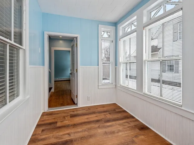 wooden floor and windows in a room