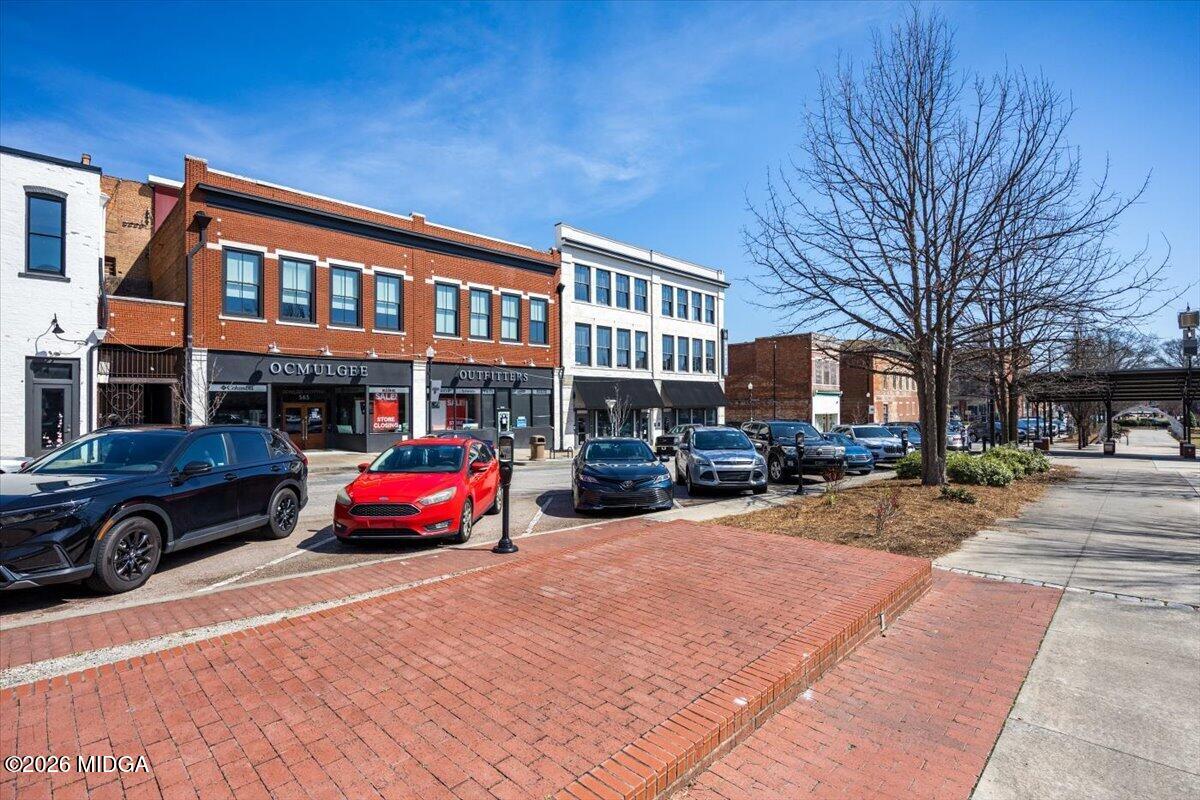 565 Poplar Street Macon, GA 31201 - Photo 12 of 12 a cars parked in front of a building