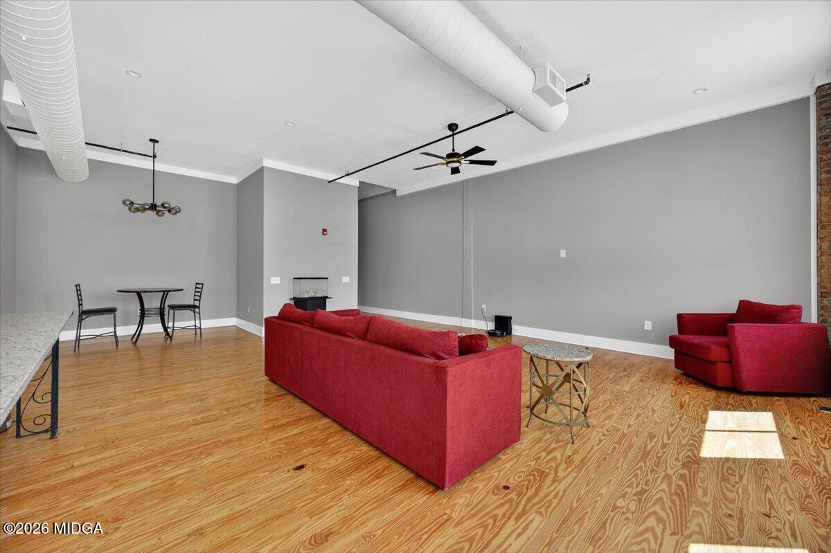 565 Poplar Street Macon, GA 31201 - Photo 6 of 12 a living room with furniture