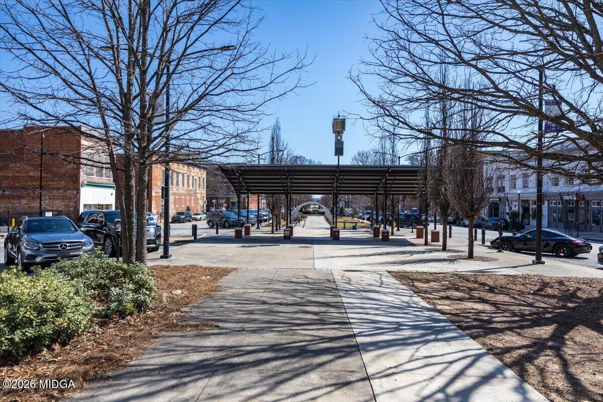 565 Poplar Street Macon, GA 31201 - Photo 9 of 12 a view of a house with a yard and tree s