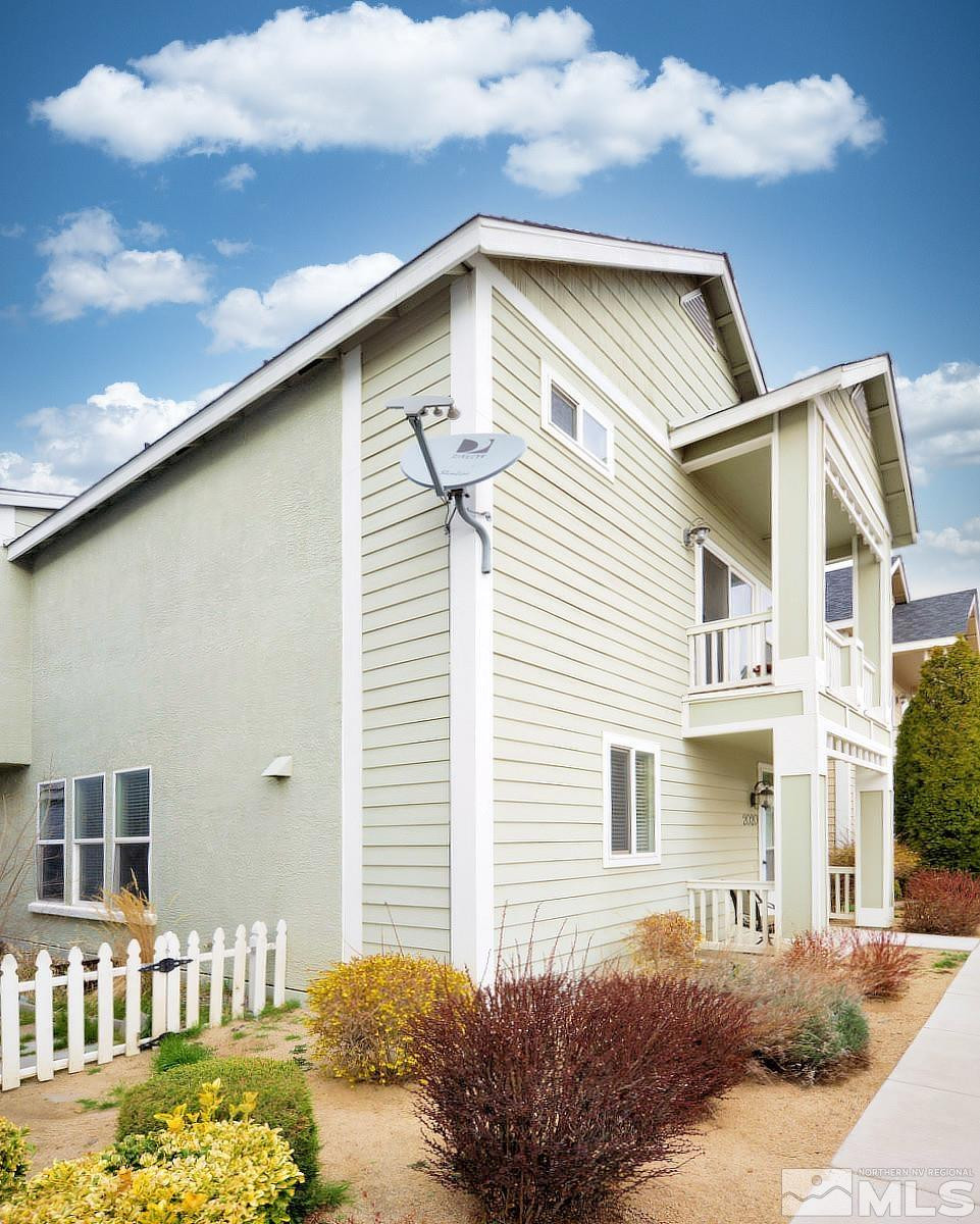 2020 Alamo Square Way Reno, NV 89509 - Photo 3 of 23 a front view of a house with a yard