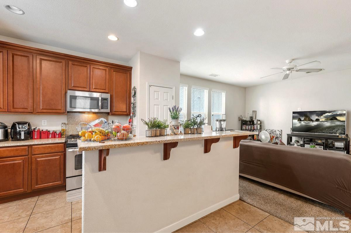 2020 Alamo Square Way Reno, NV 89509 - Photo 5 of 23 a kitchen with a sink and appliances