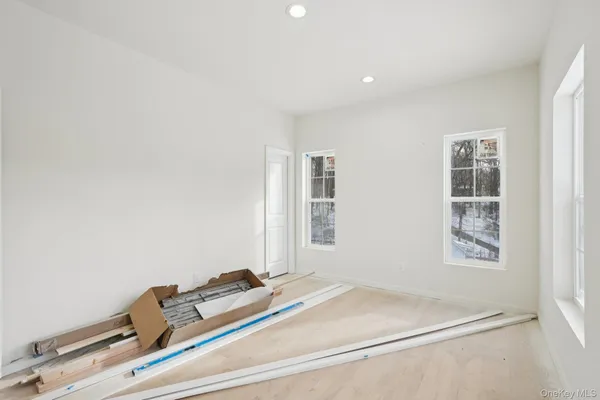 an empty room with windows