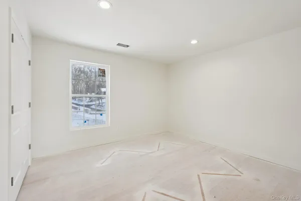 a view of staircase with rug floor