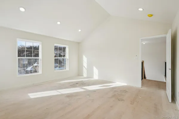 a view of a house with snow on the roof