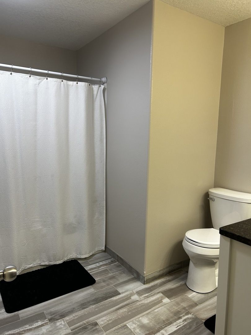 12795 Lawrence Road Sterling, IL 61081 - Photo 30 of 42 a bathroom with a sink and a toilet