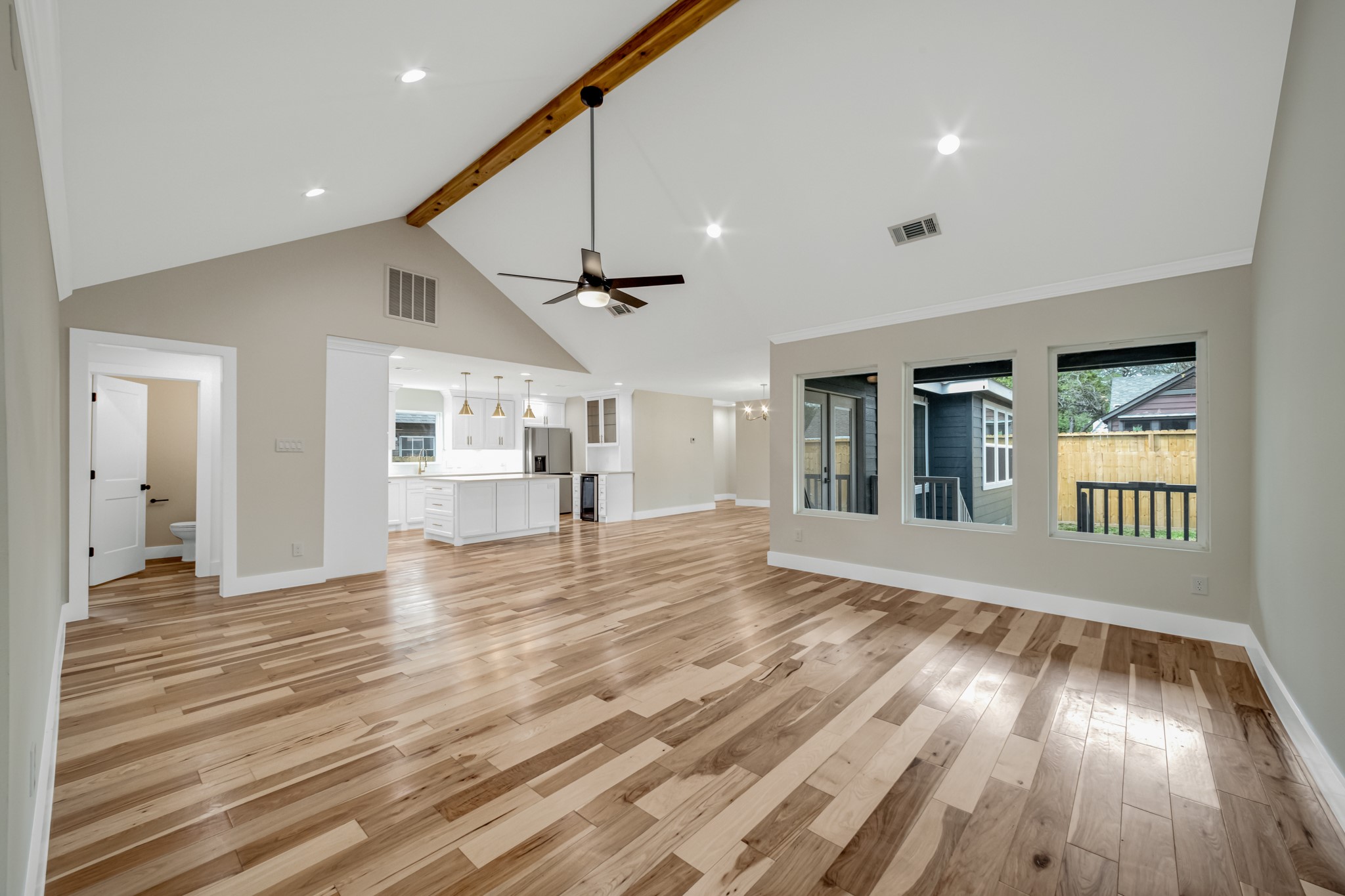 403 Moody Street Houston, TX 77009 - Photo 14 of 38 High ceilings and cedar beam draw you into the living area.