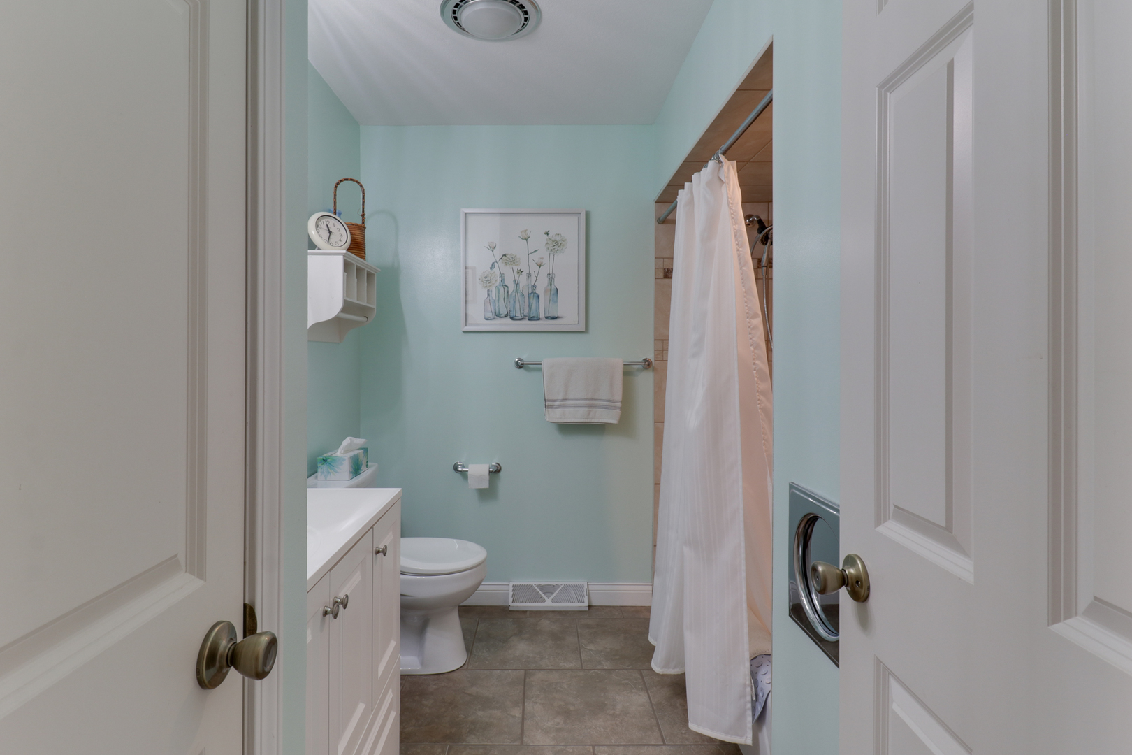 502 Jersey Avenue Normal, IL 61761 - Photo 15 of 46 a bathroom with a toilet and a shower curtain